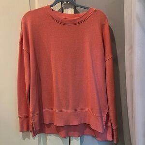 This item is coral and not too thick or thin!